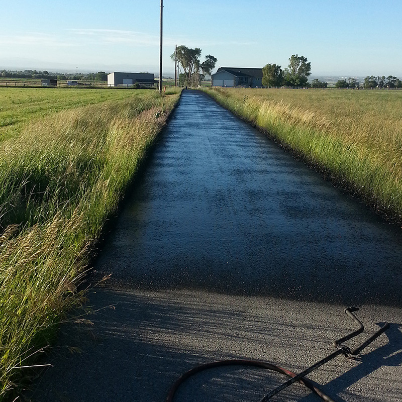 Country road with asphalt overlay.