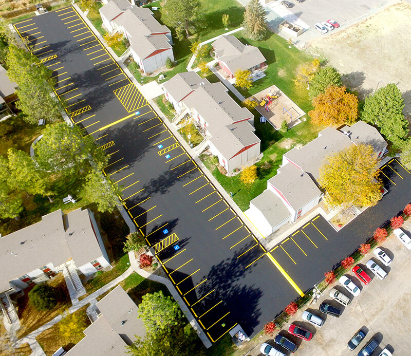 Residential complex parking lot with well defined lines.